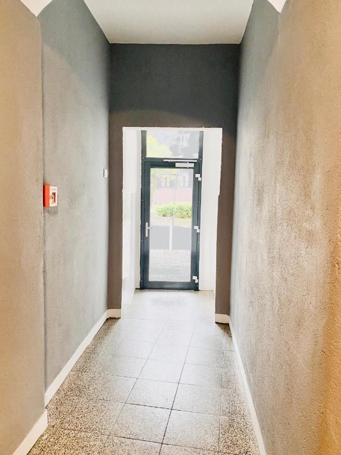 Tm Aparts Dortmund Exterior foto Entrance to the house