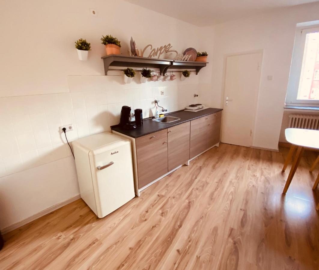 Tm Aparts Dortmund Exterior foto A typical kitchen in a student apartment